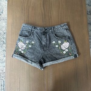 Forever 21 black denim shorts with floral appliqué